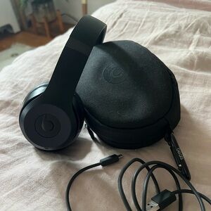 On ear headphones in Black by Beats